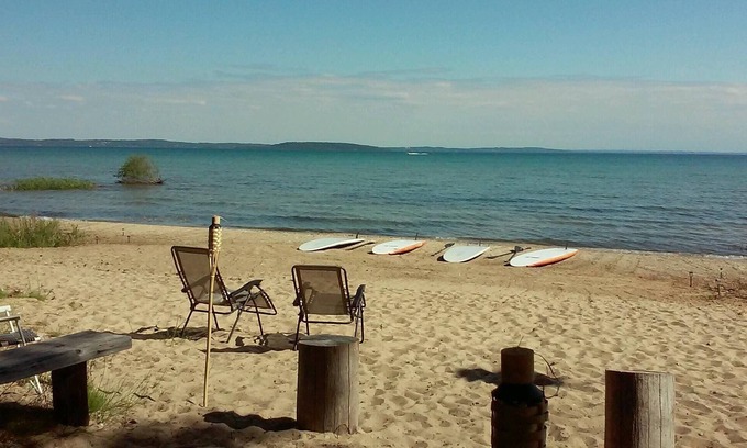 Suttons Bay House | Gorgeous Water Front Home - Sand, Sunsets & Fun!