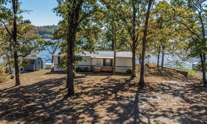 Wyandotte House | Grand Lake Fishing Cabin with Dock & Covered Boat Slip