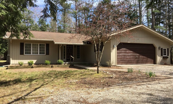 Empire House | Great Glen Arbor location! Private wooded setting, quick walk to town! Sleeps 9