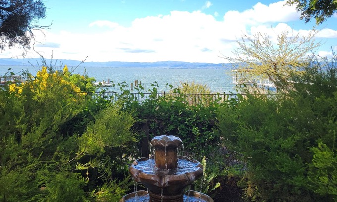 Nice Cottage | Great Price! Sunset Beach Cottage with Lovely garden, beach, and boat dock!