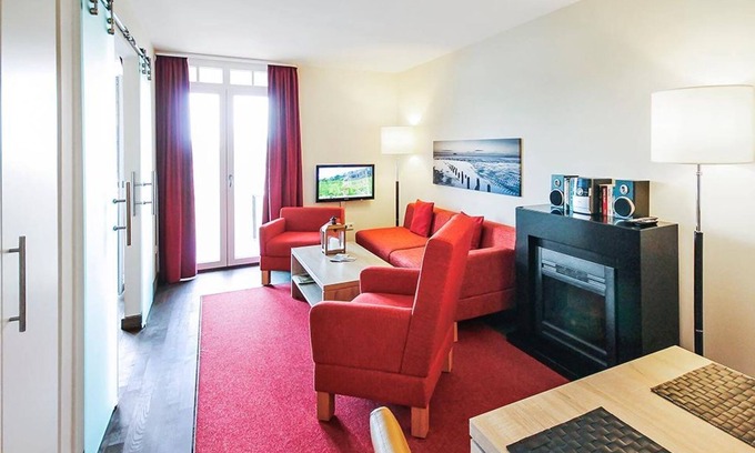 Wremen Apartment | Great, quiet apartment near the beach with sauna and balcony with dike view -