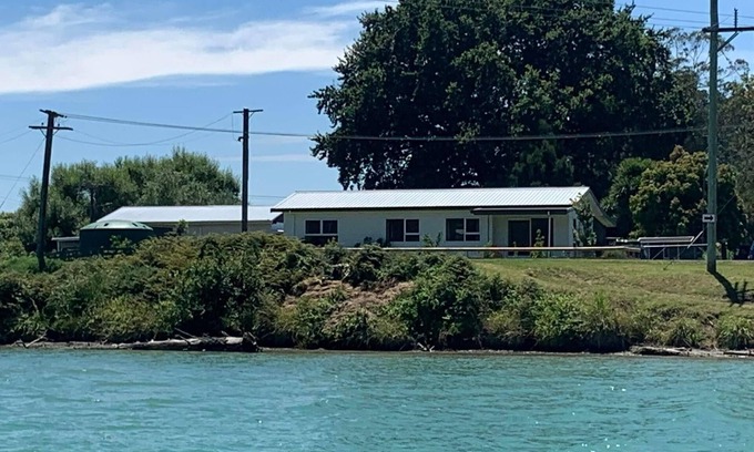 Tolaga Bay House | Great river views from this cute modernised and homely cottage!