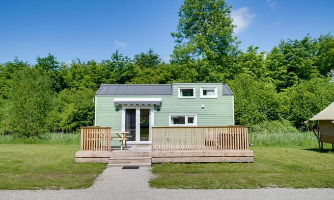 Zeewolde House | Green Tiny House with shared pool