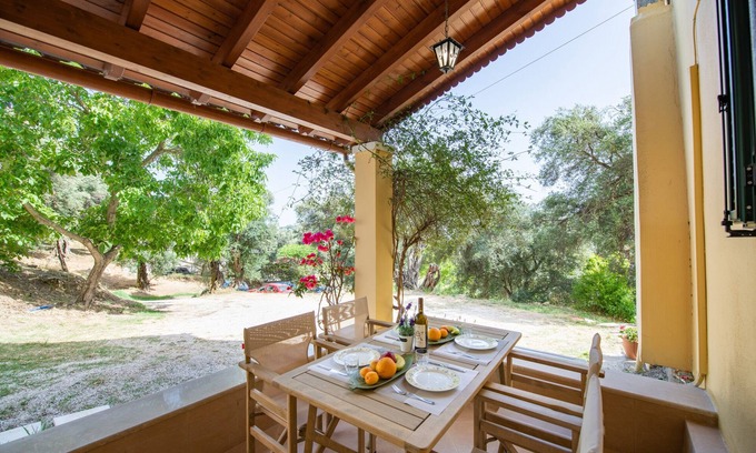 Ano Korakiana House | Green Walnut Home in Ano Korakiana is surrounded by nature on a quiet area.