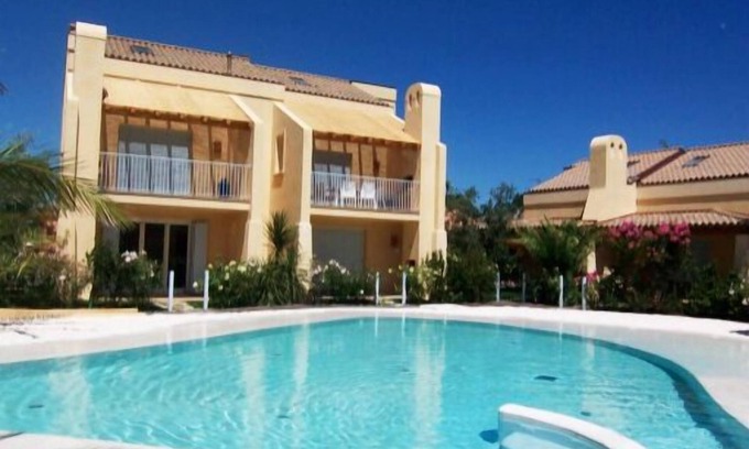 Lido di Jesolo Apartment | Ground floor apartment in Residence with swimming pool a few steps from the sea