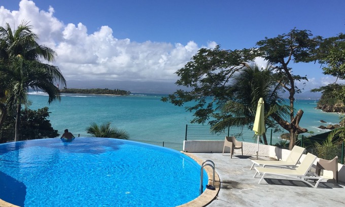 L'Houezel Apartment | Ground floor apartment with private patio courtyard. Sea view; Air conditioner;