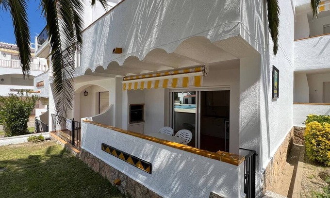 Almadraba-Canyelles Apartment | Ground floor flat with exit to swimming pool AV-03