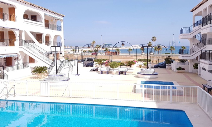Torrevieja Apartment | Ground floor in urbanization + pool + A /C + 100m beach + WI-FI + International TV + sea views