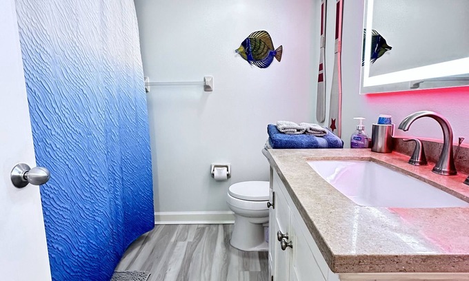 Cocoa Beach Condo | Ground Floor Open Modern, Architecturally Redesigned Just Steps from the Beach.