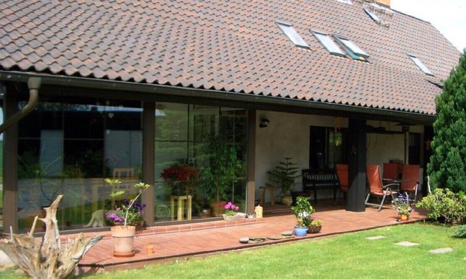 Parmen Apartment | Ground-level apartment with fireplace, edge of the Feldberg lake landscape, swimming lake on site
