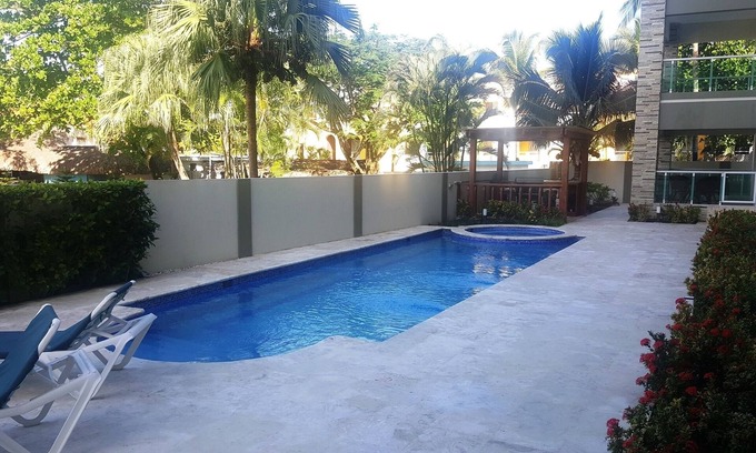 El Batey Apartment | Groundfloor 2BD 2BTH condo, guest-friendly, pool, near sandy beach/shops