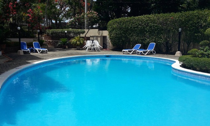 El Batey Apartment | Guest-friendly 2-BD central condo near beach, with pool, Wi-Fi, cable TV