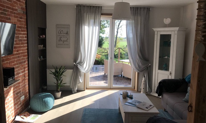 Ihlow Apartment | Gulfhof vacation apartment "Spiekeroog" on the nature reserve with a fantastic view