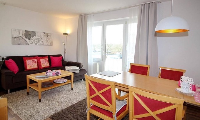 Schillig Apartment | Hübsche Ferienwohnung am Meer mit Balkon und Blick zum Grünen Nordseedeich