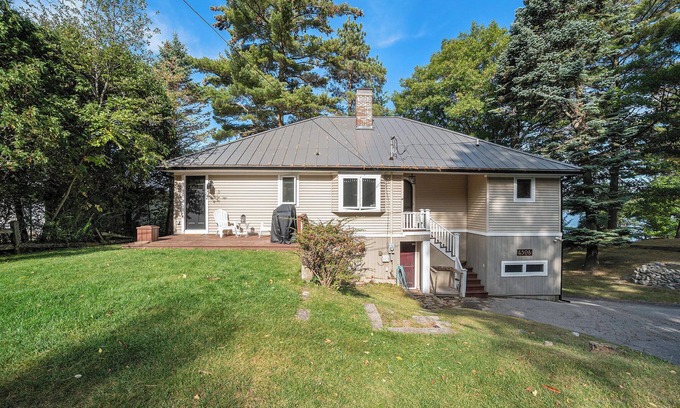 Ludington Cottage | Hamlin Lake 3 Bedroom, 2 Bath Vintage Cottage with Private Lake Frontage