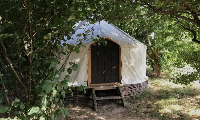 Ash Cabin | Handcrafted Grain Store Yurt in Somerset woodland; off-grid relaxation, campfire
