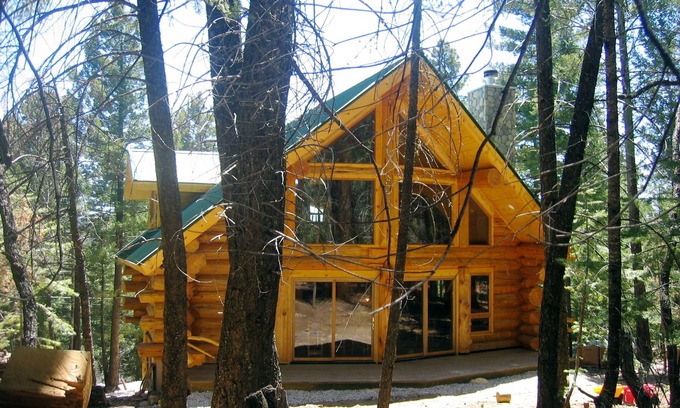 Cloudcroft Cabin | Handcrafted Log Home with hot tub backing into National Forest