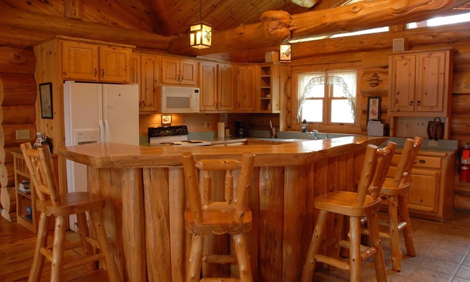 Marcell Cabin | Handcrafted log lodge on Minnesota’s clearest lake. Nestled in the woods.