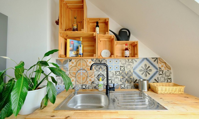 Ahlem-Badenstedt-Davenstedt Apartment | HappyBnB: naturally situated apartment with river-view, fireplace and playground