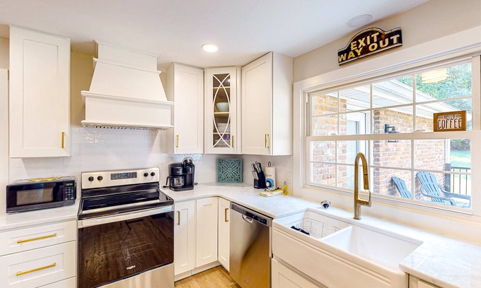 Heron Walk House | Harmonizing home with firepit, patio, deck, full kitchen, TV, and washer/dryer