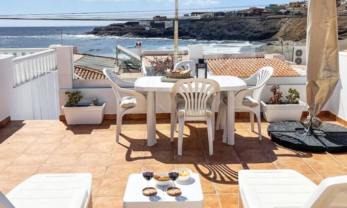 Telde Ski Chalet | Harmony Beach House - 2BR Sea Views Terrace