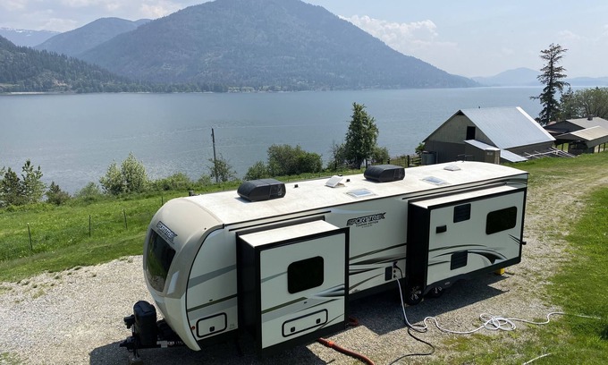 Sandpoint RV Rental | Hawkins Point on Lake Pend Oreille RV site with fire pit