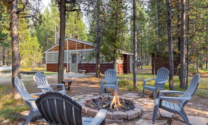 Island Park House | Hayloft Hollow by KABINO Fire Pit Fireplace Loft with Low Ceiling High Chair WiFi