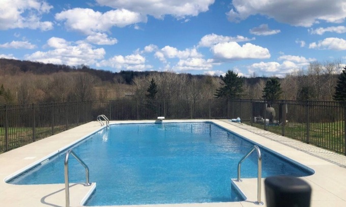 West Winfield House | HEATED POOL! 4 Bed/3 Bath home on 30 acres with pond and trails!