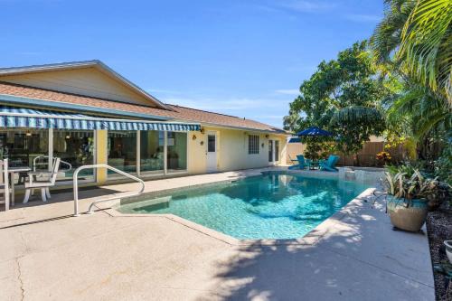 Bonita Springs House | Heated Pool & Spa Home on a Scenic, Gulf Access Canal -Close to Bonita Beach!