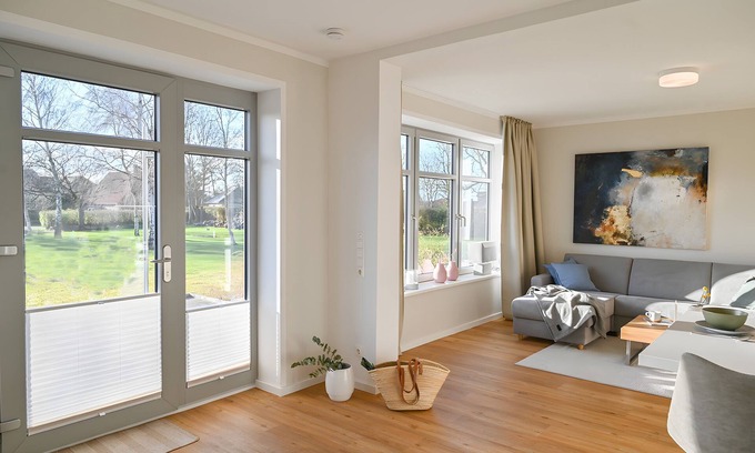 Daenschendorf Apartment | Helle Deel – Bright Holiday Apartment with Sauna and Terrace