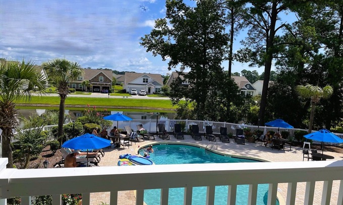 Little River Condo | HIBISCUS HAVEN - Little River - Cute 2B/2B Condo w Pool - 90+ Day Midterm Rental