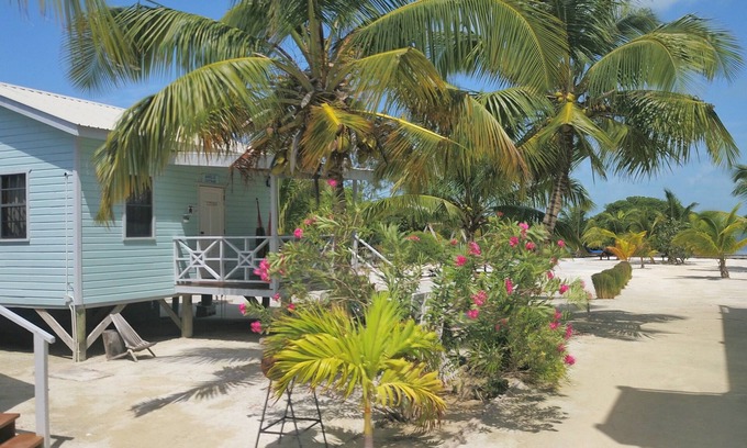 Caye Caulker Cottage | Hidden Treasure Vacation Home Bayblue Cottage Breathtaking view beautiful sunset