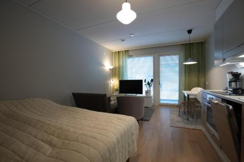 Tapiola Apartment | Hieno yksiö Tapiolan urheilupuistossa.