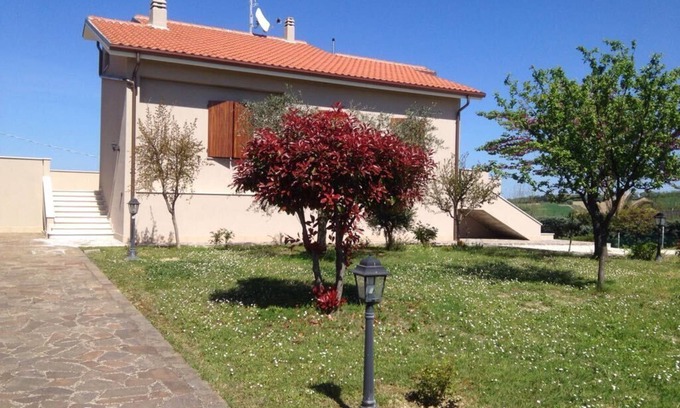 Tavullia House | Hillside villa with sea view