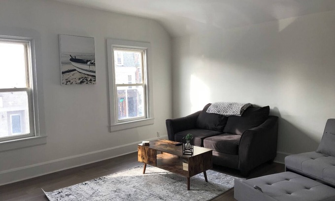 Two Rivers Apartment | Historic downtown upper loft. 6 blocks to the beach π