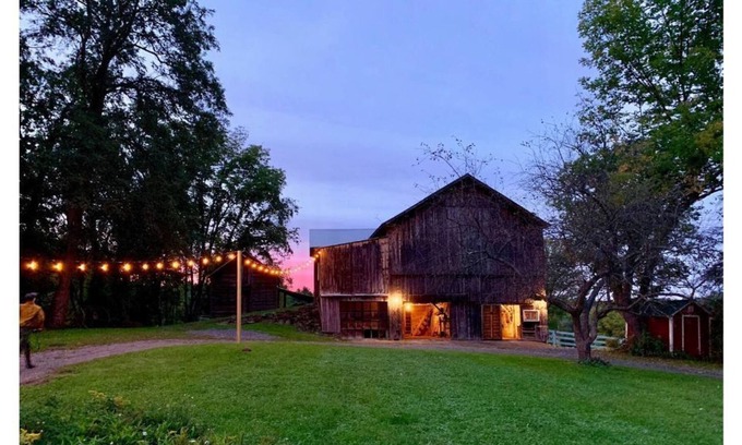 Greenville House | Historic Hudson Valley farmhouse with scenic barn and fire pit on a working farm