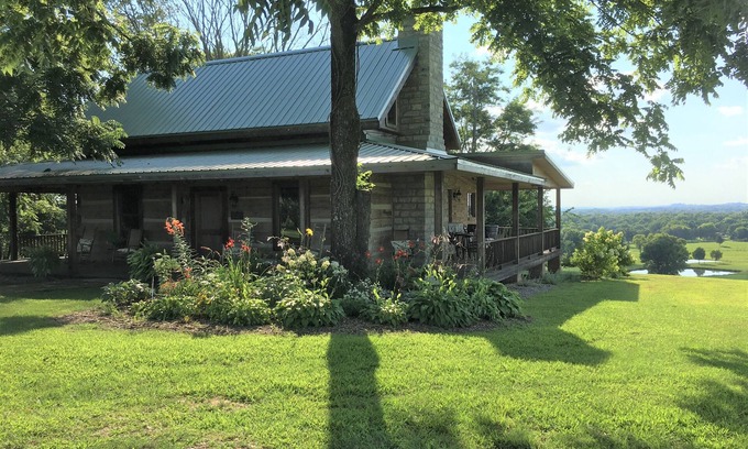 Dixon Springs Cabin | Historic Log Cabin on 200 acre farm, pasture and forest with panoramic views!