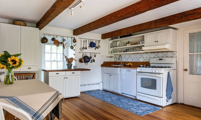 Accord House | Historic stone house & barn on 10 acres with patio, fireplace, & antique charm