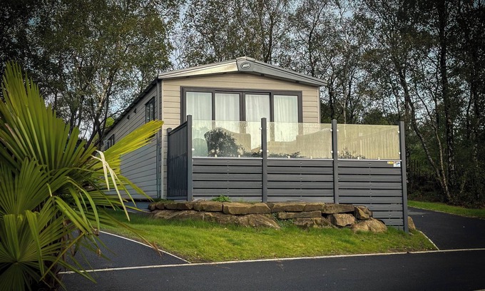 Longridge Cabin | Hobbit - House Of The Owl.nLuxury lodge with views. Pet friendly. Indoor Pool.