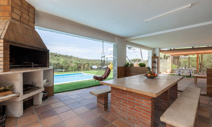 Llinars del Valles Apartment | Holiday Apartment "Armonia Estudio, Comparte Exterior" with Mountain View, Shared Pool & Wi-Fi