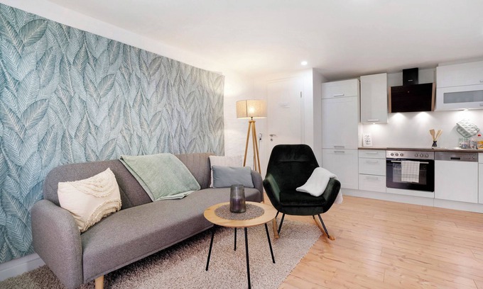 Oelsnitz Apartment | Holiday Apartment 'Grünzweig' with Private Terrace by the Water