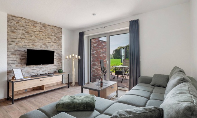 Lastrup Apartment | Holiday Apartment 'Anna 1 Eg' with Private Terrace and Garden