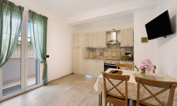 Andora Apartment | Holiday Apartment "Antichi Ricordi - La Stalla" with Terrace, Shared Pool & Wi-Fi