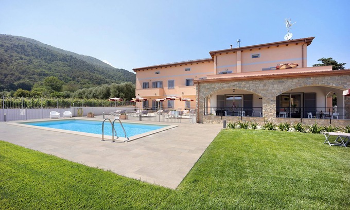 Andora Apartment | Holiday Apartment "Antichi Ricordi - Il Fienile" with Balcony, Shared Pool & Wi-Fi