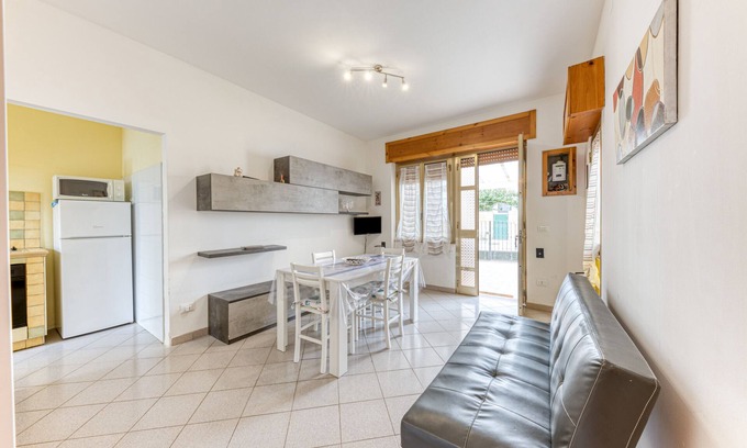 Lido Marini Apartment | Holiday Apartment "Baia Del Mare" with 2 Private Terraces, Private Garden & A/C