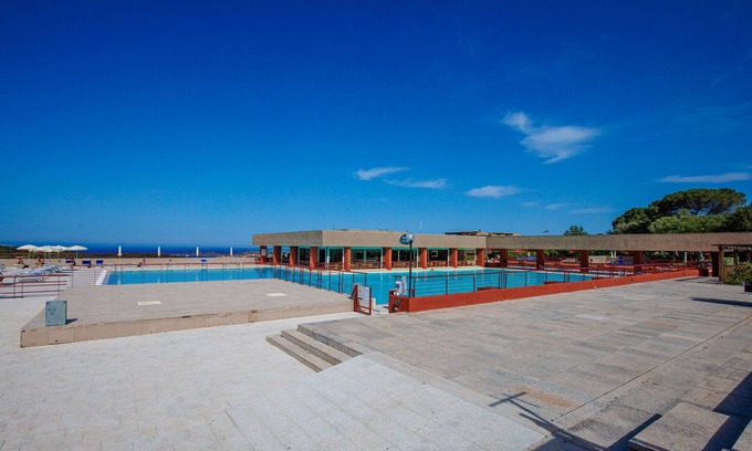 Cugnana Verde Apartment | Holiday Apartment Casa relax a Cugnana Verde with Sea View, Shared Pool & Wi-Fi
