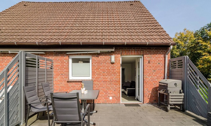 Wangerland Apartment | Holiday Apartment 'Nordsee' with Shared Terrace, Shared Garden & Wi-Fi