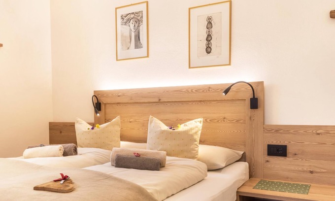 Colfosco Apartment | Holiday Apartment with direct access to ski slopes Cocoon CIASA with Mountain View, Wi-Fi & Garden; Parking Available