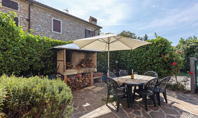 San Zeno di Montagna House | Holiday Home 'Villetta Singola' with Lake View, Private Terrace and Wi-Fi