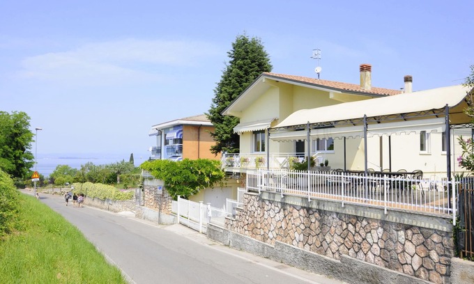 Pacengo House | Holiday Home by Lake Garda with Garden